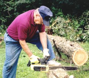 Swatara Towship resident Frederick Panza works with a chain saw.