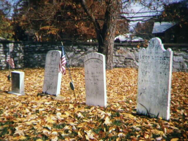 Photo showing three tombstones of slaves, right oblique view.