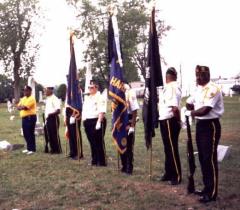Members of the American Legion Honor Guard stand ready to begin the ceremony.  Click for a larger image.